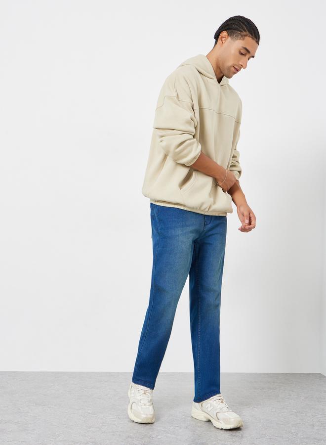 ستايلي جينز بتفاصيل مشطوفة قصة عادية - Image 1